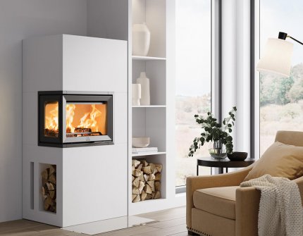 Jøtul FS 520 FL fireplace with white surround in a modern living room