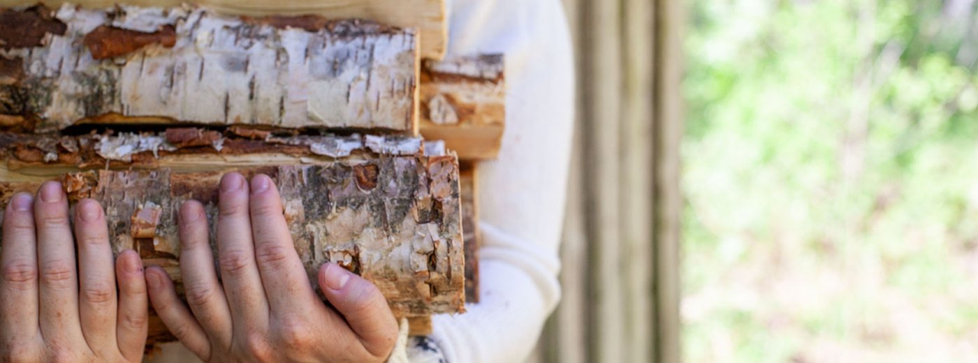Girl carrying firewood