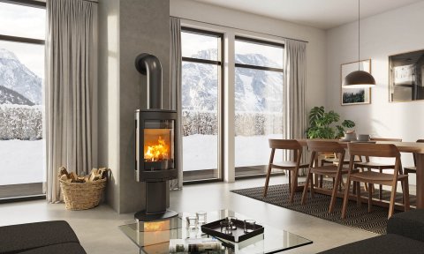 Jøtul F 373 Advance a black wood burning stove in a grey and modern living room